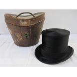 Gieves Limited silk top hat (small tear to the fabric in the rim) within original fitted leather hat