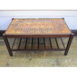 Tile topped rectangular coffee table with undertier, 56cm wide