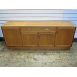 Mid 20th century G-Plan teak sideboard with curved bar handles, single drawer above cupboard,