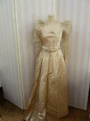 Victorian  ivory satin wedding dress with pleated bodice, full skirt, chiffon ruched sleeves -