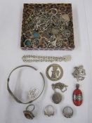 Silver rope-pattern chain, a silver locket, a silver and coral stone set pendant, various rings