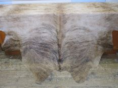Large cow skin hide throw, mottled tan colour, 197cm x 190cm approx