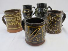 Five 20th century pottery tankards to include one inscribed 'Randwick Wap 1990', another marked '