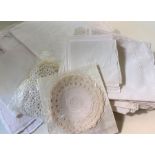 Assorted table linen to include damask napkins, embroidered tablecloths, etc (1 bag)