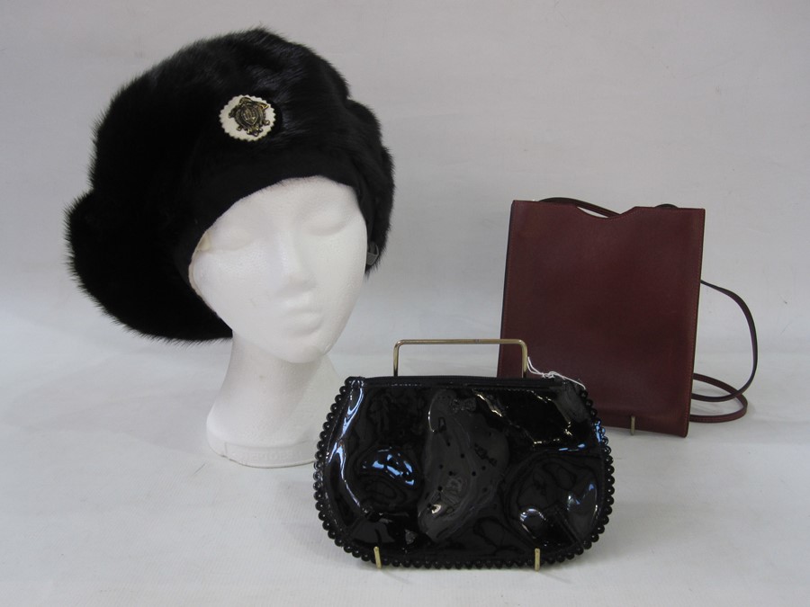 Birger Christensen mink beret, Anya Hindmarch black patent leather zipped make up bag and a small