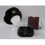 Birger Christensen mink beret, Anya Hindmarch black patent leather zipped make up bag and a small