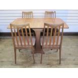 E Gomme for G-Plan set of four teak dining chairs with brown upholstered seats, label to