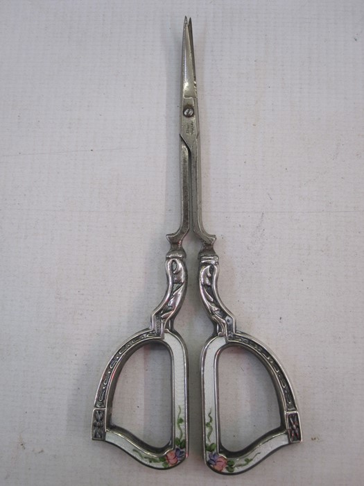 Pair of German silver and enamel scissors, marked 'Batpre Germany', 'Sterling', white enamel