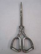 Pair of German silver and enamel scissors, marked 'Batpre Germany', 'Sterling', white enamel