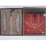 Embroidered Palestinian dress front, framed, a Bedouin dress front, framed, a tribal dress front