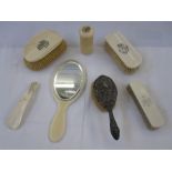 Ivory dressing table set to include mirror, clothes brush, shoe horn and two hair brushes bearing