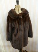 Vintage dark brown mink coat, three quarter length, with a cowl collar, bracelet sleeves, single