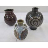 Two Rupert Andrews studio pottery vases in purple, 13.5cm and 11cm high and David Eeles studio