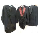 Three vintage dinner suits, one tail coat , one morning suit jacket and various trousers and a