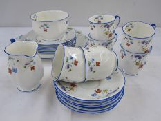 Standard china part tea service comprising of six cups, saucers, plates, slop bowl and milk jug,