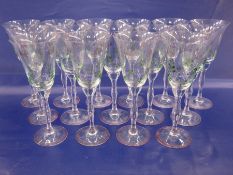 Suite of Orrefors Sweden hand-painted glasses, decorated with purple flowers and green stems, to