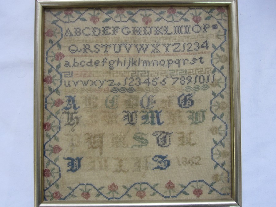 19th century sampler with alphabet and floral border, dated 1862, 23cm x 22cm approx