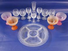 Four coloured glass sundae dishes, ten cut brandy and wine glasses and an hors d"oevres dish