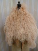 Vintage ostrich feather cape lined with apricot-coloured chiffon and two other ostrich feathers