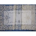 Cotton table runner with bobbin lace fringe with matching place mats and a square net cloth bordered