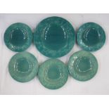 Set of five Ashtead turquoise pottery plates and matching charger with running deer to rim of plates