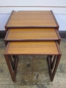 R Bennett G-Plan Quadrille nest of tables, 53.5 cms, and a rectangular coffee table, the nest of
