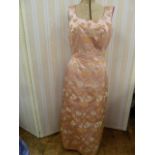 1960's pink brocade full length evening dress, and a blue chiffon with printed gold swags and