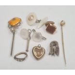 Miniature gilt-coloured and enamel heart-shaped memorial pendant enclosing hair with single white