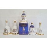 Five ceramic Bells bottles with liquid contents inside to include Charles and Lady Diana 1981