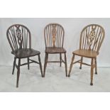 Six assorted wheelback dining chairs (6) and a box of glassware