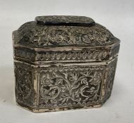 Eastern silver coloured metal lidded box, floral relief decoration, unmarked, 6toz. approx. 7cm