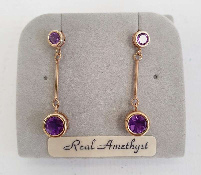 Pair 9ct gold and amethyst drop earrings, each set pair graduated stones  Condition