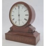 Mahogany-cased mantel clock, the circular dial with Roman numerals and indistinctly marked