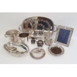 Silver plated tray of oval form with two handles and pierced gallery, silver plated photograph frame