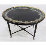 Oval centre table with papier mache and mother-of-pearl inlaid tray top, on ebonised bamboo-effect