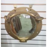 Wall mirror set in brass porthole frame, 37cm wide