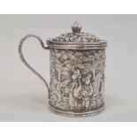 Chinese Wang Hing embossed silver mustard pot, cylindrical and lidded, decorated autour with figures
