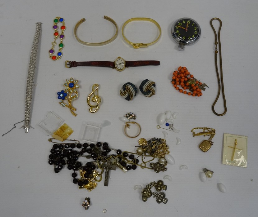 Quantity of costume jewellery to include clip-on earrings, gold-coloured bangles, rosary beads,