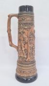 German Gerzit extra large pottery stein, embossed medieval figures and having blue glazed borders,