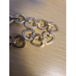 9ct gold heart link bracelet, 29.6g Condition ReportNo obvious splits, dents or breaks. There is