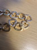 9ct gold heart link bracelet, 29.6g Condition ReportNo obvious splits, dents or breaks. There is