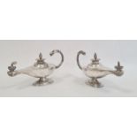 Pair silver table lighters, each in the form of Roman lamp with free scroll eagle's head handles,
