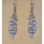 Pair of late 19th/early 20th century diamond set drop earrings, stylised leaf design, set with