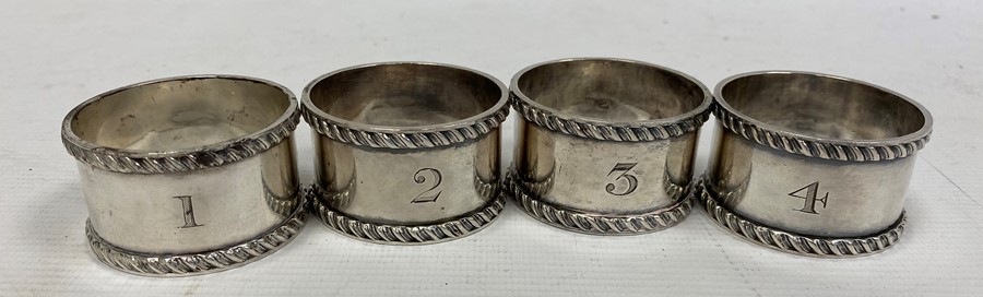 A set of four late 19th century silver napkin rings, numbered 1-4, maker Atkin Brothers, Sheffield