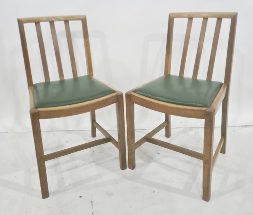 Pair of oak dining chairs with railbacks and curved cresting rail (2)