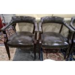 Set of four, possibly Victorian, armchairs covered in green leather, mahogany frames, to brown china