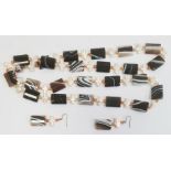 Agate bead necklace, the rectangular banded agate beads interspersed with pearlised crosses, with