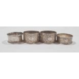 A pair of late 19th century silver napkin rings, engraved decoration, makers William Hutton &