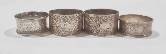 A pair of late 19th century silver napkin rings, engraved decoration, makers William Hutton &