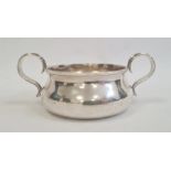 An Edwardian silver two-handled porringer, London 1908, maker Holland, Aldwinckle & Slater, 4.